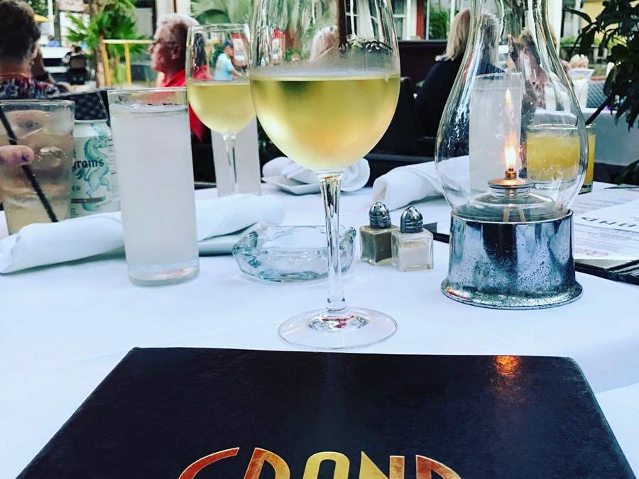 Grand cafe menu and wine glasses